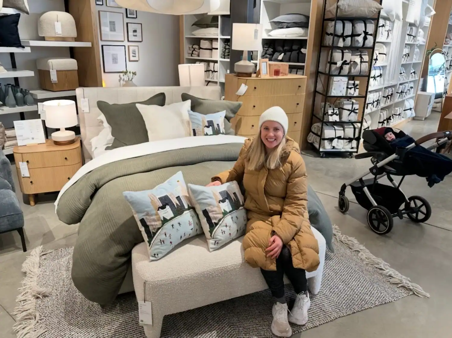 Nicole with her art in physical form demonstrating the importance of doing work you love